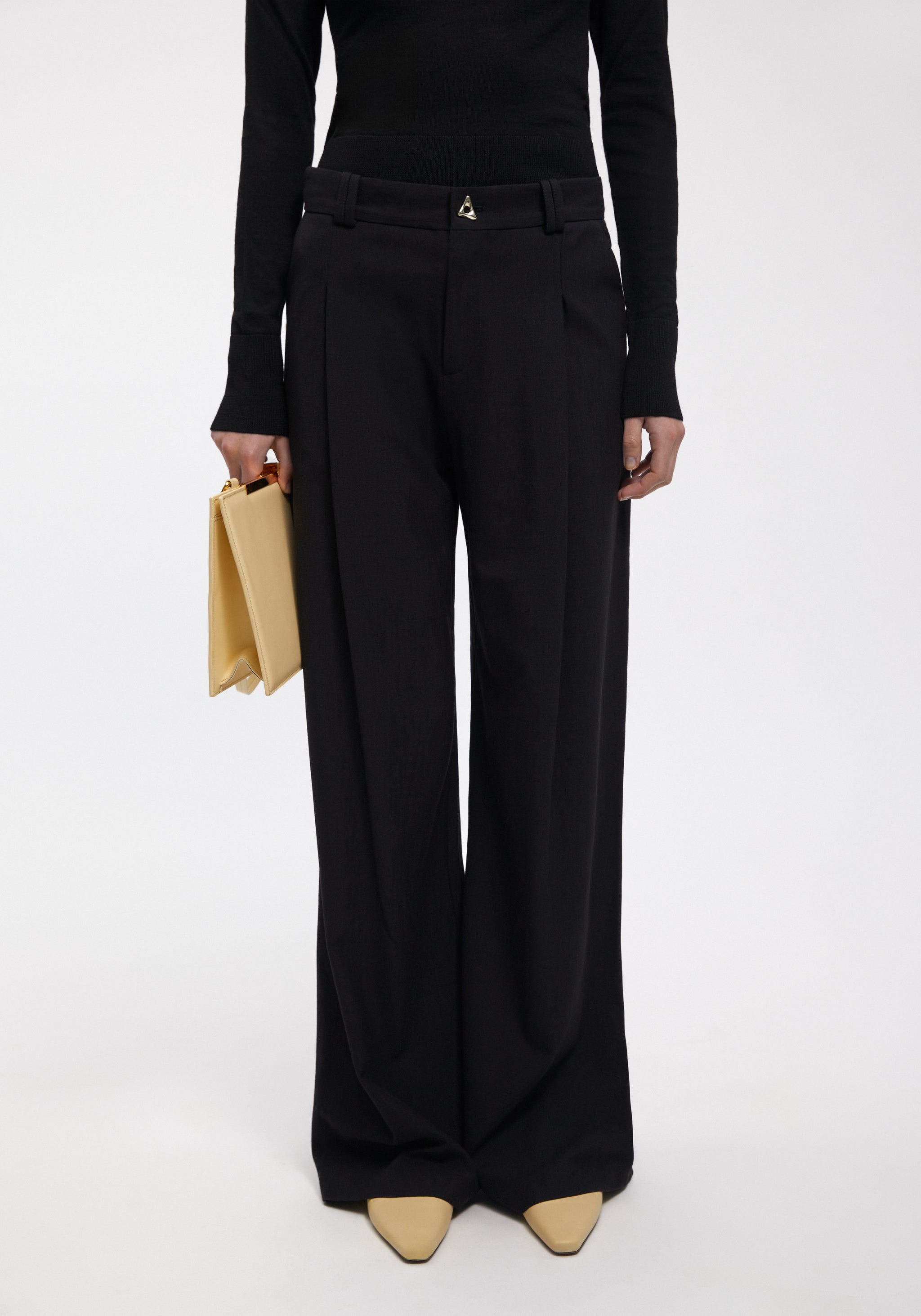 AERON - WELLEN - Wide leg pants - BLACK